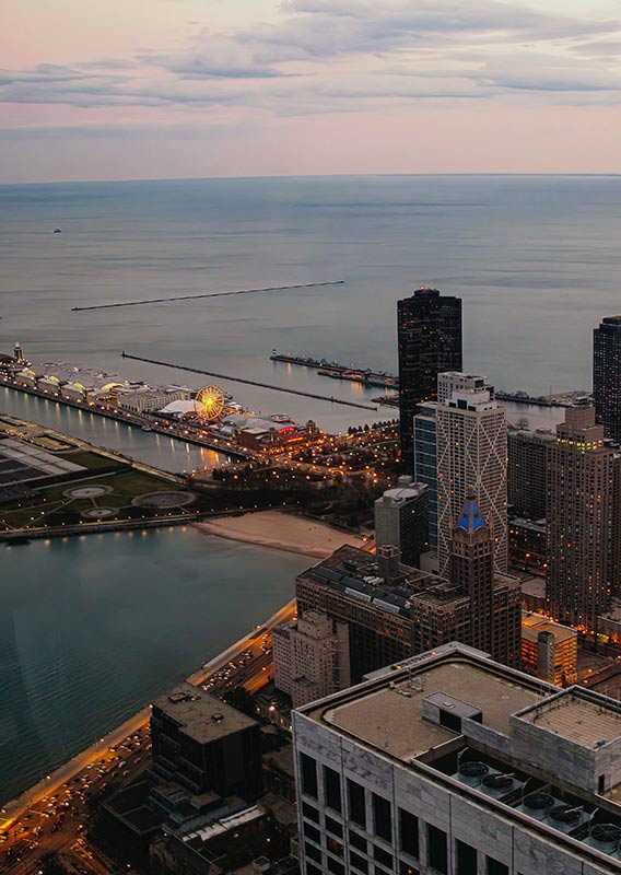 An aerial view above downtown Chicago looking towards the waterfront.